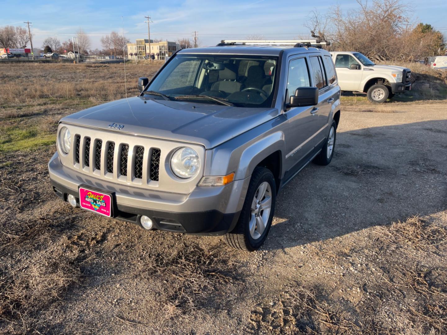 2017 Silver /Black Jeep Patriot Latitude (1C4NJRFBXHD) with an 2.4L L4 DOHC 16V engine, AT transmission, located at 813 E Fairview Ave, Meridian , ID, 83642, (208) 336-8230, 43.618851, -116.384010 - Photo#2